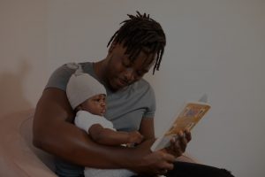 Nigeria-parent-teaching-child-to-love-reading-with-tutors
